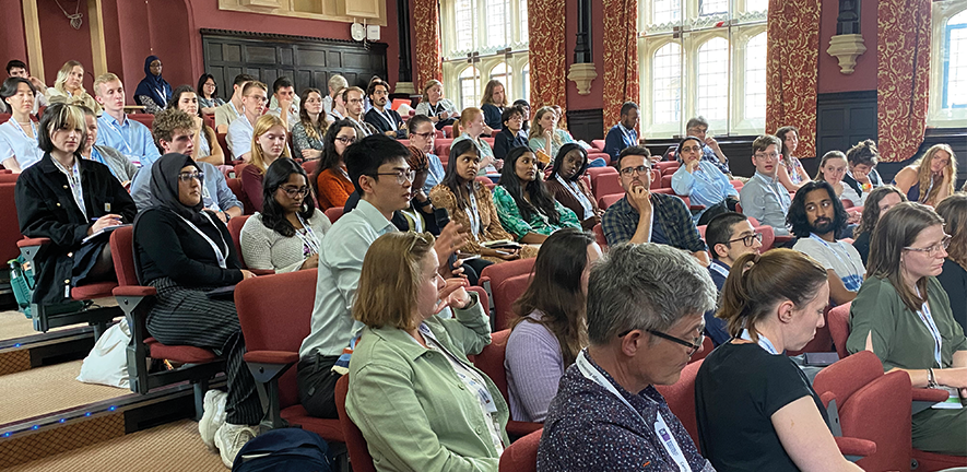 students in lecture theatre at Cambridge Biosciences DTP Symposium 2023